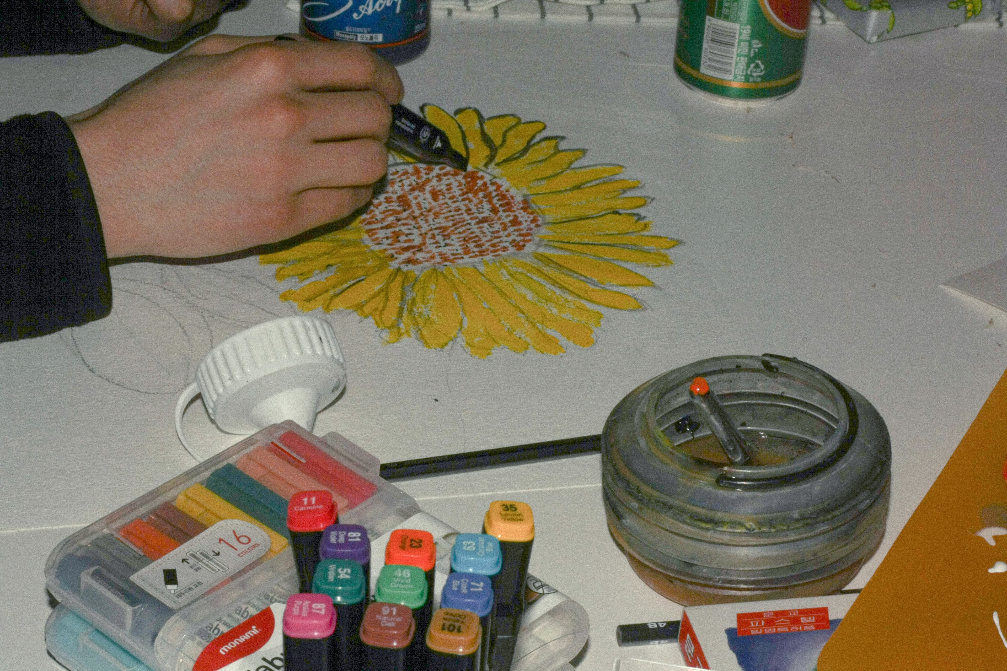 Child drawing and creating